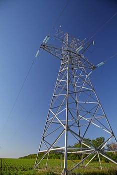 High voltage tower in the field.