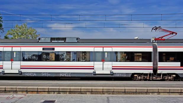 Train on station as background. Spain, Europe.