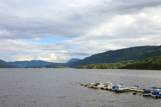 Norway lake view in summer. Tungsten landscape.