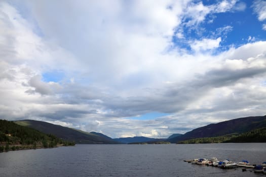 Norway lake view in summer. Tungsten landscape.