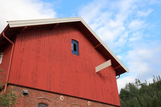 Typical red wooden house architecture in Norway.