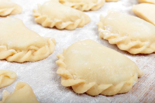 Close up shot of dumplings during prepare process.