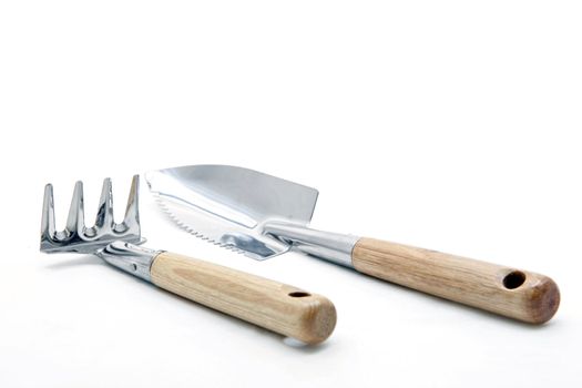 gardening fork shovel trowel lute isolated on white background