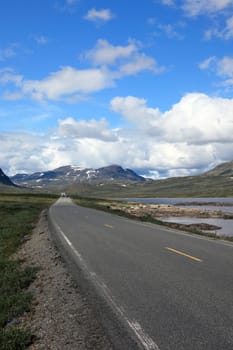 Norwegian road, situated deep in the mountains, Scandinavian Europe landscapes.