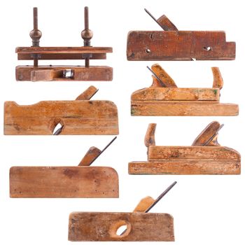 Collection of antique woodworking tools, isolated on white