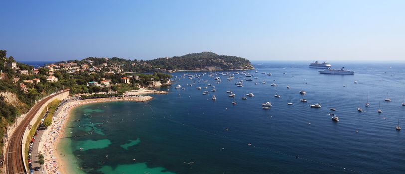 Panoramic view of a beatufil bay near harbor of the city of Nice, France. Cote D'Azur railroad.