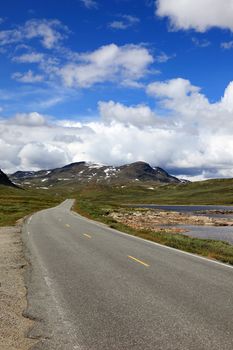 Norwegian road, situated deep in the mountains, Scandinavian Europe landscapes.