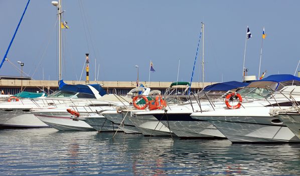 Yachts and boats in Tenerife harbor, Canary Islands views.