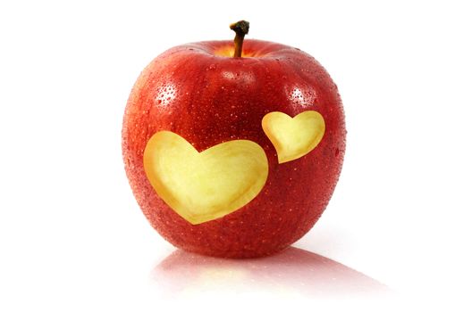 fresh red apple with heart shape