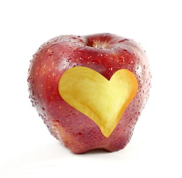 fresh red apple with heart shape