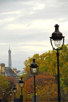 Street in Paris France with lightposts on overcast autumn day