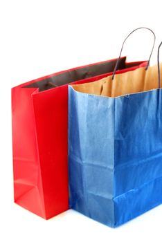 Two paper shopping bags isolated on white background