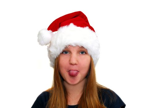 Portrait of a young girl wearing Santa's hat isolated on white background