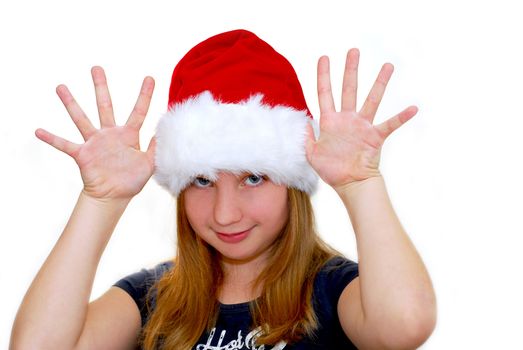 Portrait of a young girl wearing Santa's hat isolated on white background