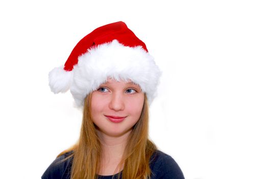 Portrait of a young girl wearing Santa's hat isolated on white background