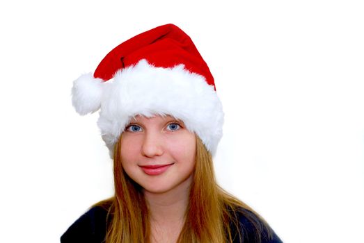 Portrait of a young girl wearing Santa's hat isolated on white background