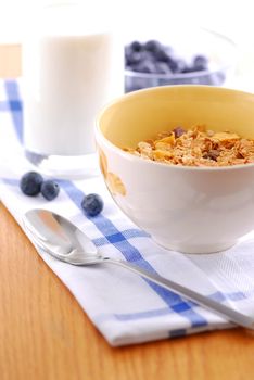 Healthy breaksfast of cereal, milk and blueberries