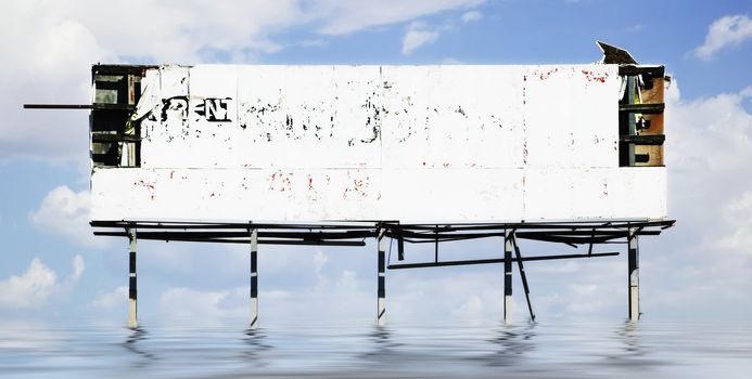 Dilapidated old billboard falling apart against a cloudy sky.