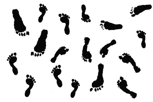 Black silhouette outlines of actual children's footprints on white;