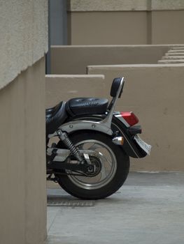 A generic motorcycle against an urban background