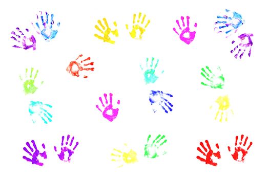 Colorful handprints made by children on white background.;