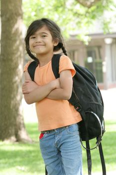 Adorable five year old girl ready for first day of school;