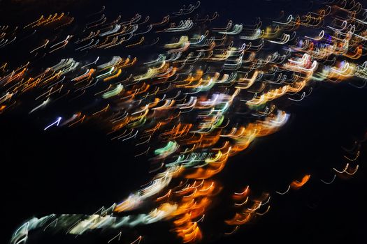 Horizontal landscape of musical notes Minims floating mid air in the form of a tornado on a dark background, colors, copy space and negative areas