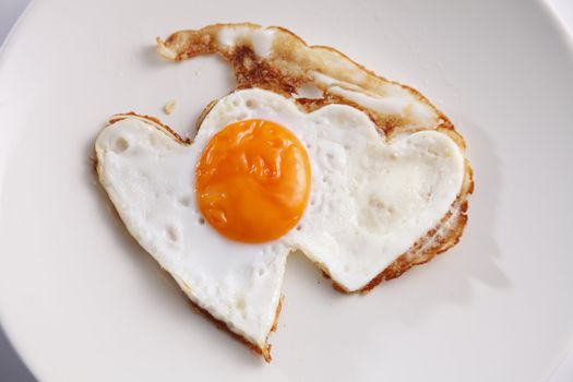romance breakfast with heart shape fried egg