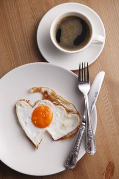 romance breakfast with heart shape fried egg