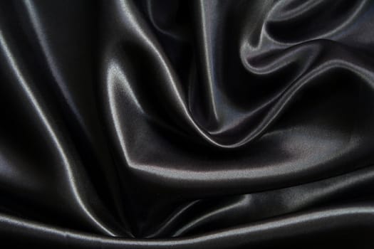 Smooth elegant black silk can use as background 