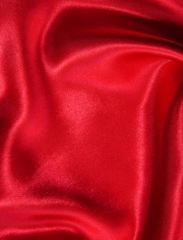 Smooth elegant red silk can use as background 