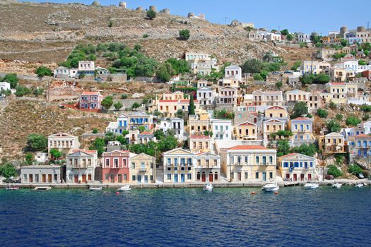 Greece. Dodecanesse. Island Symi (Simi). Colorful houses 
