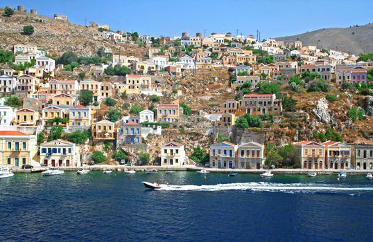 Greece. Dodecanesse. Island Symi (Simi). Colorful houses 
