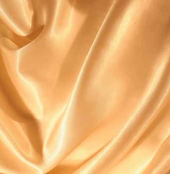 Smooth elegant golden silk can use as background

