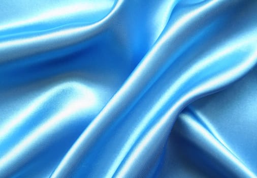 Smooth elegant blue silk can use as background

