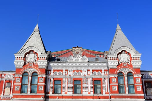 Town landscape with historic theater and blue sky