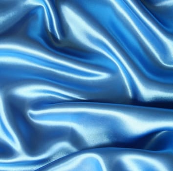 Smooth elegant dark blue silk can use as background 