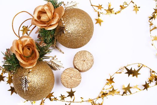 Christmas card with golden balls and candles on white 