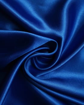 Smooth elegant dark blue silk can use as background 