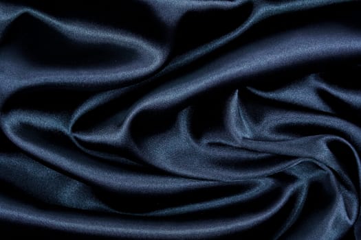 Smooth elegant black silk can use as background 