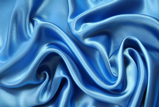 Smooth elegant dark blue silk can use as background 
