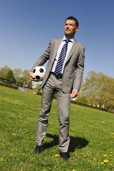 Business man coaching soccer
