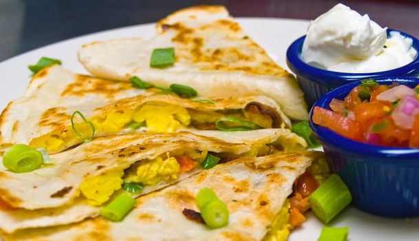 Breakfast Quesadilla with Sour Cream and Salsa