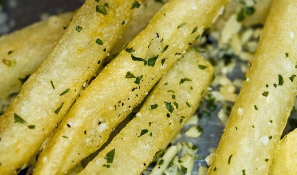 Closeup of a Serving of Seasoned French Fries