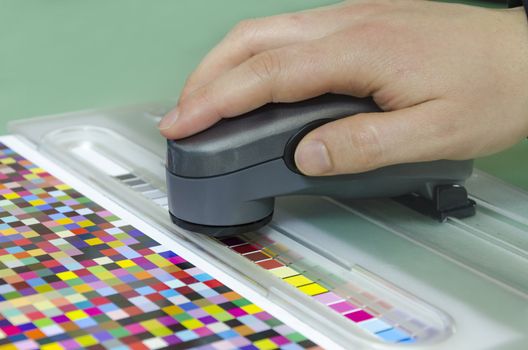 spectrophotometer verify color patches on Test Arch, Press shop prepress department