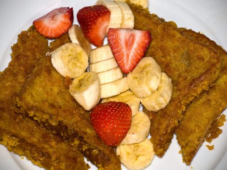 French Toast with Sliced Bananas and Strawberries