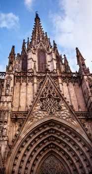 Gothic Catholic Cathedral Facade Steeple Barcelona Catalonia Spain.  Built in 1298.  This is the main spire.