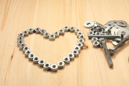 Heart of nuts on wood table