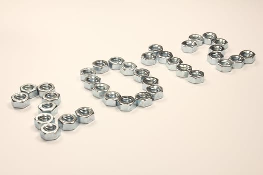 Digits 2012 of nuts on white background