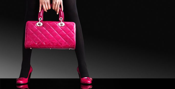 fashionable woman with a pink bag,fashion photo